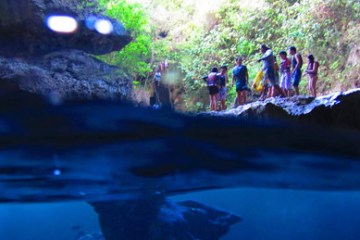 A group of guests prior to jumping into the grotto waters