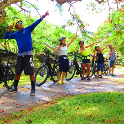 A group of bike riders posing for a fun picture