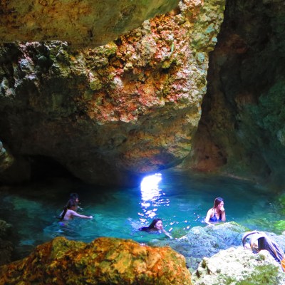People swimming in the Forbidden Pool