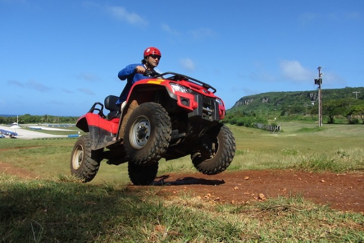 A man riding an ATV