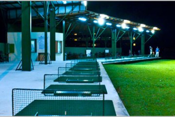 a table topped with lots of green grass